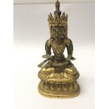 A Quality gilt metal figure of an Indian goddess. With applied cold painted decoration. Height