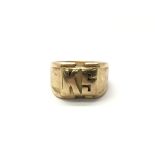 An unmarked gold ring with the letter K S embossed to the front, total weight approx 18.5 grams.