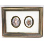 A pair of framed convex ceramic panels in the style of Sevres, one depicting two cherubs, the
