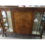 A walnut display cabinet with solid door flanked by glazed doors on cabriole legs - NO RESERVE