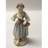 A Quality late 19th Century Meissen figure of a young lady with a cut basket of fruit. Height 13.5cm