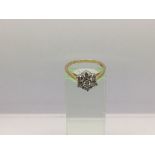 An 18ct white gold seven stone diamond ring, approx 3.7g and approx size Q.