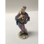 A 19th century Meissen figure the galley cook holding a large spoon some minor damage and