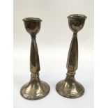 A pair of silver plated candlesticks.Approx 25cm,