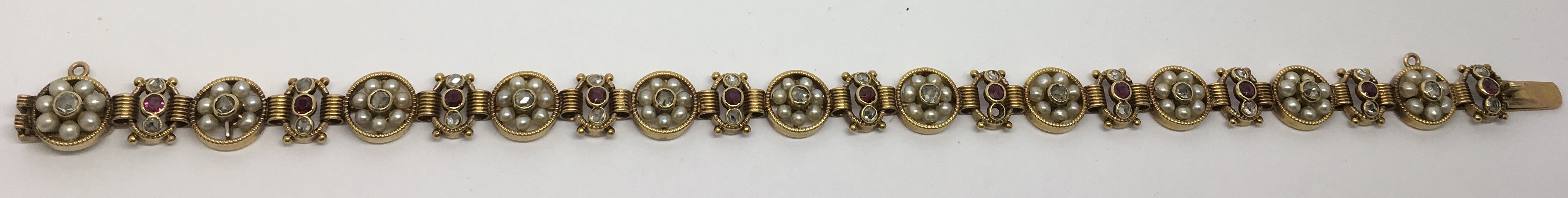 A Gothic revival, 18ct gold link bracelet set with