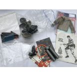 Action Man vintage clothing , boots, paperwork and an Action Man Bazooka gun, carded, 40th