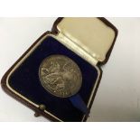 A Silver British Indian steam navigation medallion in original case and a small collection of