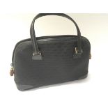 A Ladies Black Gucci hand bag. 27x18cm.