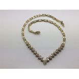 A 14ct gold and diamond necklet, approx 2ct and approx 25g.