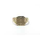 A 9ct gold ring with sunburst design, total weight approx 5.4 grams, ring size U/V.