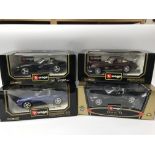A collection of boxed 1:18 scale diecast vehicles including Burago, Dodge Viper, Mercedes Benz