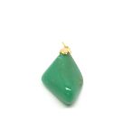 A jade and gold pendant, weight approx 12.3 grams.