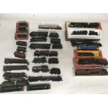 Included are 14 OO gauge locomotives, 7 of which are boxed. Also included are a number of rolling