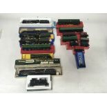 Included are 8 boxed locomotives, including a wren City of stoke and Trent. Also included are a