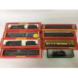 Included are 5 boxed hornby oo gauge locomotives, and 3 boxed carriages.