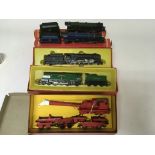 Included are 4 boxed hornby o gauge locomotives with tenders and a boxed hornby train with extra