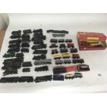 Included are 20 00 gauge locomotives and a large assortment of rolling stock, including a boxed