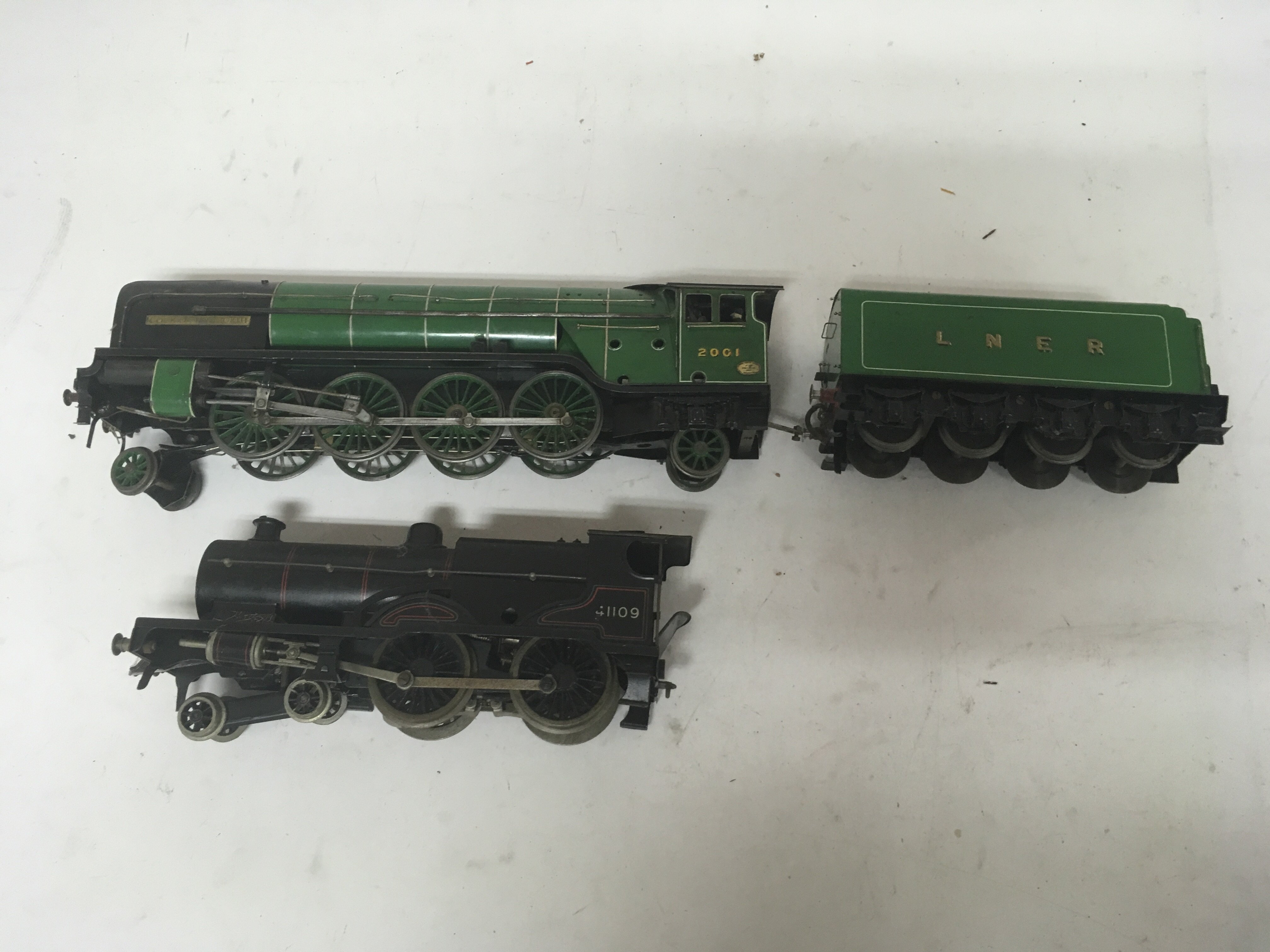 Included are a pair of o Gauge locomotives, one having a tender.