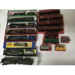 Included are 7 boxed oo gauge locomotives, including a 3 rail Dorchester. Also included are 4