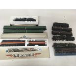 Included are a number of OO gauge items including, 2 motorised coaches a boxed daylight locomotive