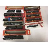 Included are 6 OO gauge locomotives and 5 coaches.