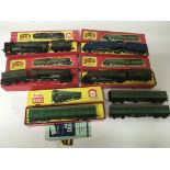 Included are 5 boxed hornby oo gauge locomotives and 2 tenders. 4 of the locomotives are 3 rail.