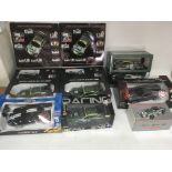 Included are boxed model racing cars including 2 that are remote control and a Mercedes Benz.