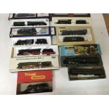 Included are 7 boxed oo gauge locomotives and 1 boxed carriage.