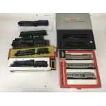 Included are 8 OO gauge locomotives, including 2 boxed one with a tender and the other with