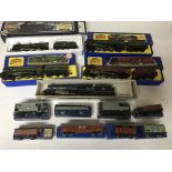 Included are 5 oo gauge locomotives, including 3 3 rail locomotives. As well are including various