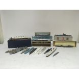 Included are a number of model boats including a model of the titanic and also Triang Minic, Dinky