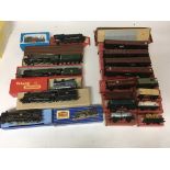 Included are 7 boxed oo gauge locomotives, including a 3 rail locomotive. Also included is a