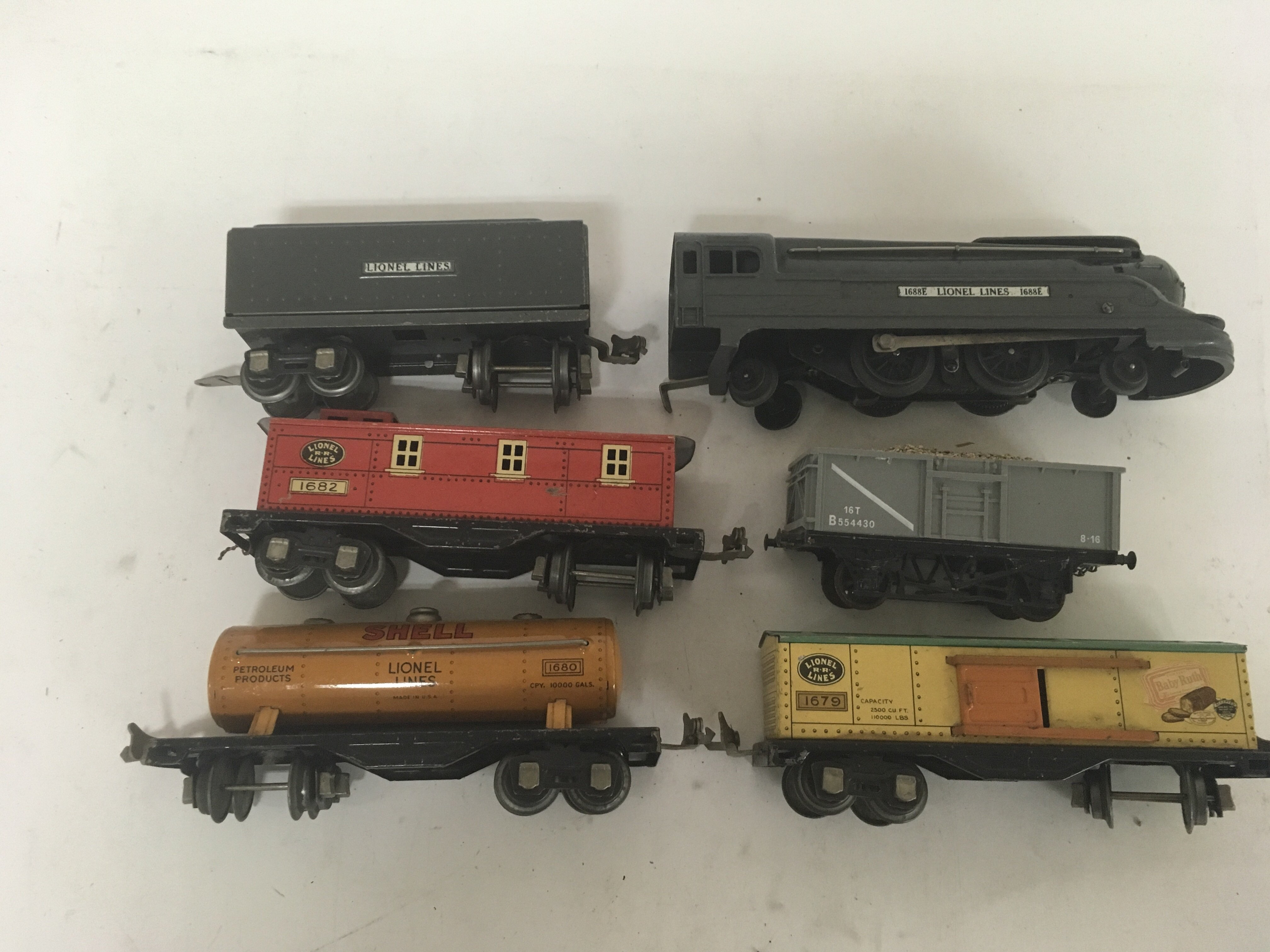 Included is a Lionel lines locomotive with tender and rolling stock.