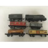 Included is a Lionel lines locomotive with tender and rolling stock.