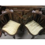 A Edwardian inlaid salon suit, comprising two seater sofa four corner chairs and two open armchairs