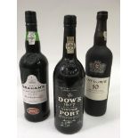 Three bottles of vintage port including a Dow's 19