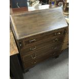 An Edwardian inlaid bureau.