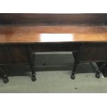 A regency mahogany sideboard the raised back and r