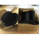 A Dunn & Co top hat plus a bowler hat by the same company (2).