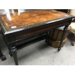 A Victorian burr walnut card table on turned flute