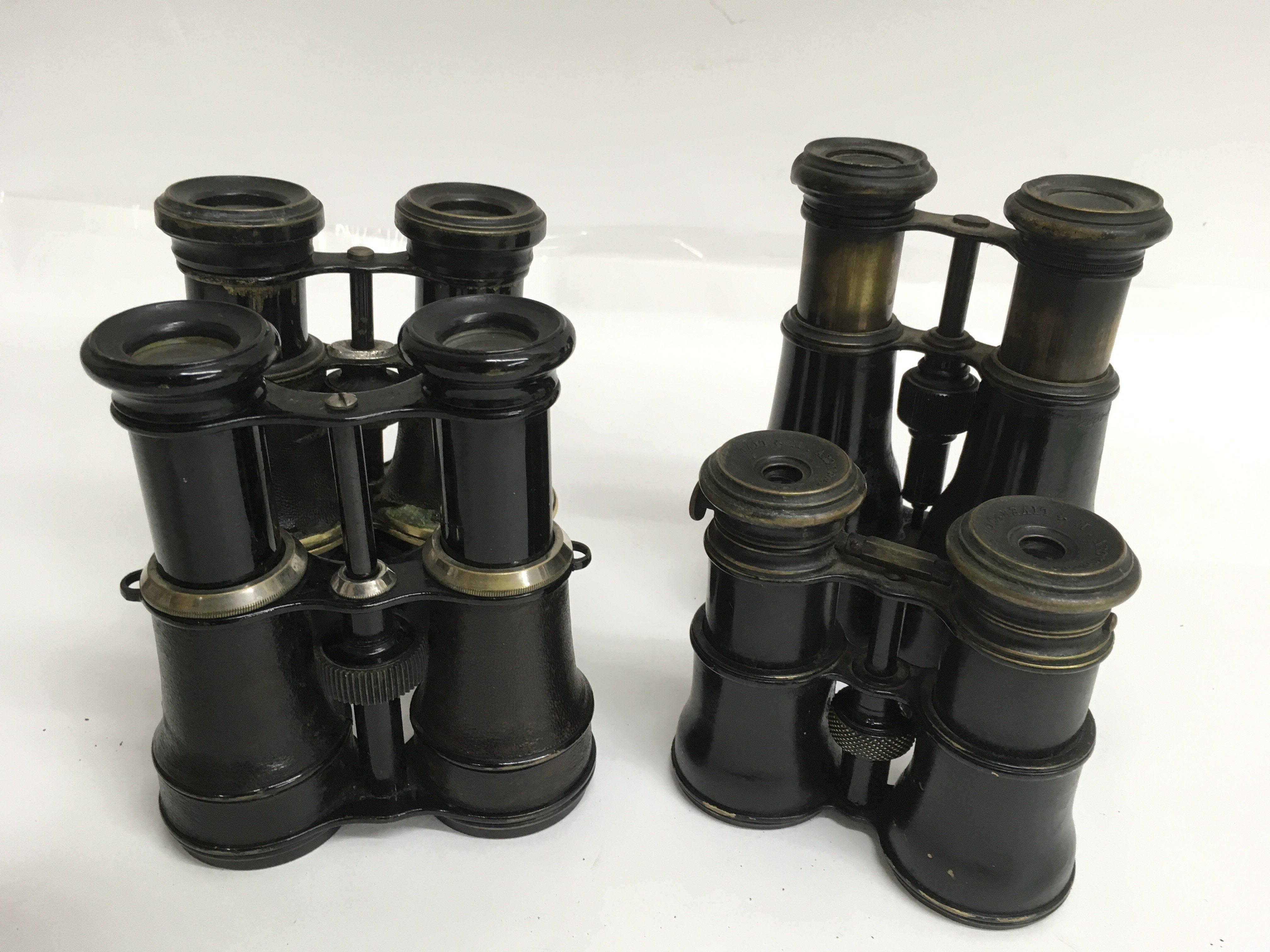 Four pairs of vintage binoculars including one pai