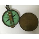 A 19th century oxidised brass cased compass maker