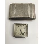 An Art Deco silver, square purse watch