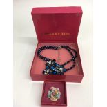 A boxed Butler&Wilson blue flower necklace and sim
