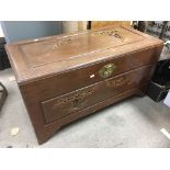 A carved camphor wood chest, approx 93cm x 45cm x 50cm.