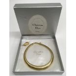 A boxed Christian Dior collar necklace and brooch