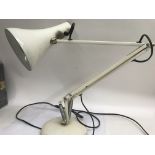 A anglepoise lamp