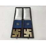 A pair of German WW2 SS long service awards, one f