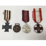 A group of four German medals comprising a 1936 Ol