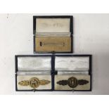 A pair of German WW2 close combat badges in copy p